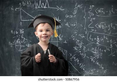 Smiling child with graduate suit