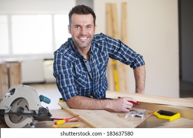 Smiling construction worker at work 