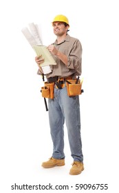 Smiling construction worker writing notes