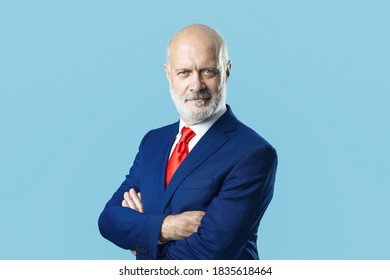 Smiling corporate businessman posing with arms crossed - Shutterstock ID 1835618464