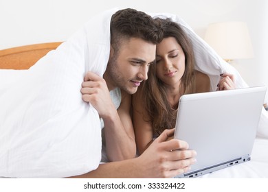 Smiling Couple Bed Notebook Stock Photo 333324422 | Shutterstock