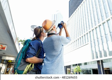 Smiling couple with the camera