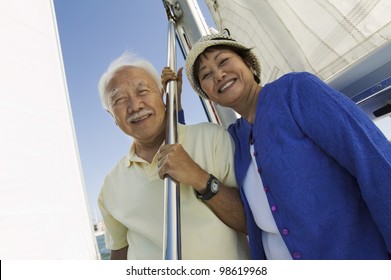Smiling Couple on Sailboat