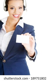 Smiling Customer Service Representative With Headset Holding A Blank Empty Businesscard. Isolated On White Background.