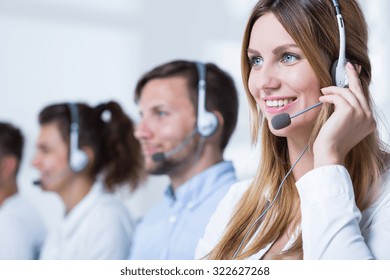 Smiling Customer Service Representative Talking With Client