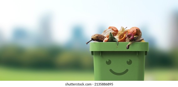 Smiling cute garbage bin character full of organic biodegradable waste, separate waste collection and recycling concept - Shutterstock ID 2135886895