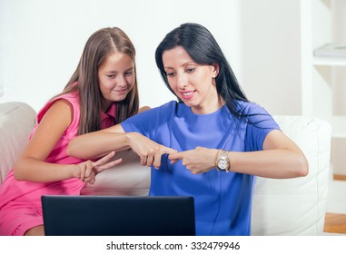 Smiling Deaf Woman And Child Talking Using Sign Language On The Smartphone's Cam