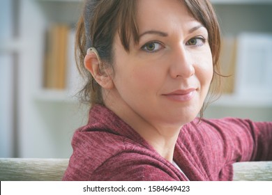 Smiling Deaf Woman Wearing Hearing Aid