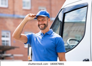 Smiling Delivery Men Or Handyman In Uniform Near Truck - Powered by Shutterstock