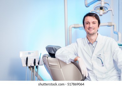 Smiling Dentist Presenting His Dental Practice