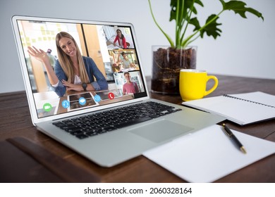 Smiling Diverse Elementary School Pupils And Teacher During Class On Laptop Screen. Communication Technology And Online Education, Digital Composite Image.