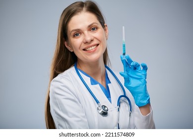 Smiling Doctor Holding Syringe With Vaccine. Isolated Female Medical Worker Portrait.