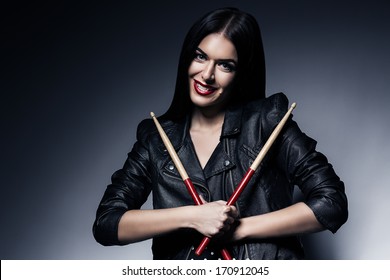 Smiling Drummer Woman With Drum Sticks