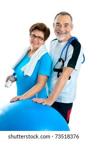 Smiling Elderly Couple Working Out In Gym. Isolated On White