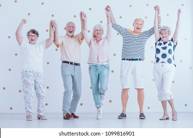 Smiling Elderly People Having Fun While Enjoying New Year's Eve Party