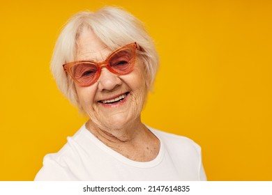 Smiling Elderly Woman Vision Problems With Glasses Yellow Background