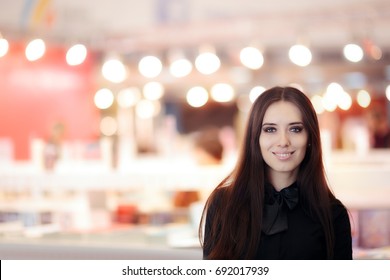 Smiling Elegant Woman Wearing Black Shirt and Bow-tie Standing Indoors - Beautiful girl welcoming guests to a formal event