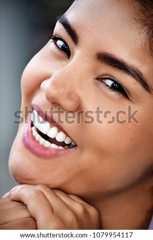 Smiling Face Of Young Happy Woman