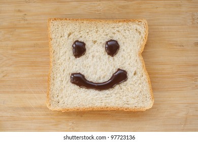 The smiling faces painted on the bread