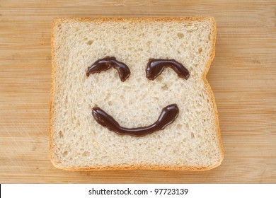 The smiling faces painted on the bread