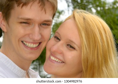 Smiling Faces Of A White Eastern European Couple Toronto, Ontario, Canada - June 25, 2011 With Model Releases