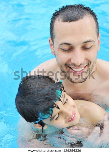 Smiling Father Son Leaning Water Pool Stock Photo 126254336 Shutterstock