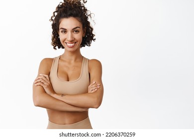 Smiling Female Athlete, Sportswoman In Activewear Looking Confident, Fitness Trainer Inviting To Workout, Personal Training In Gym, Standing Over White Background.