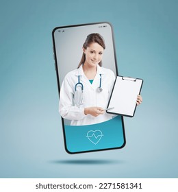 Smiling female doctor on smartphone screen giving a medical prescription: online doctor video consultation concept - Powered by Shutterstock