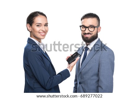 smiling female journalist interviewing a businessman, isolated on white