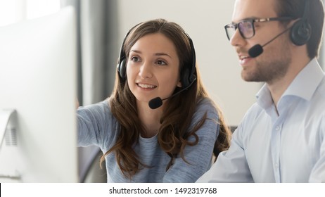 Smiling Female Mentor In Wireless Headset Teaching Call Center Operator Intern Close Up, Coach Training Customer Support Service Staff, Using Computer, Consulting Client On Phone, Horizontal Photo