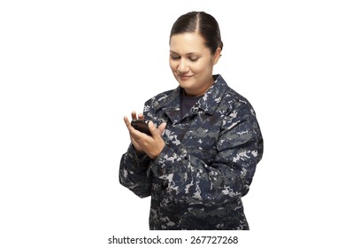 Smiling Female Navy Sailor Text Messaging