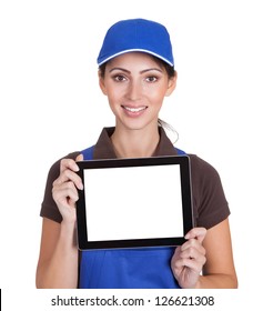 Smiling Female Plumber Holding Digital Tablet. Isolated On White