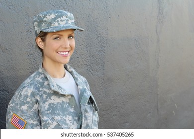 Smiling female soldier standing with copy space