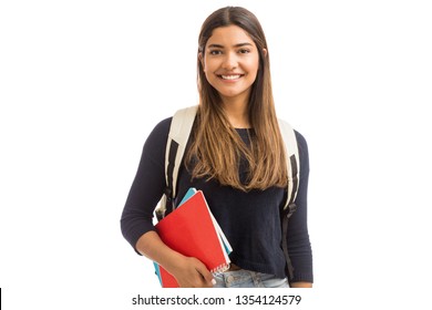 Smiling female student enhancing her future by attending regular lectures - Shutterstock ID 1354124579
