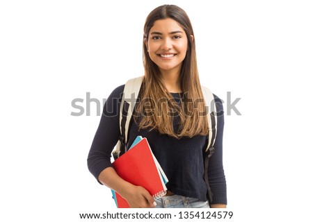 Smiling female student enhancing her future by attending regular lectures