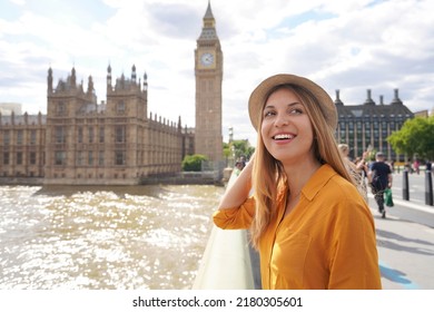 Smiling female tourist visiting London sights, United Kingdom - Shutterstock ID 2180305601