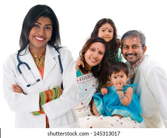 Smiling Friendly Indian Female Medical Doctor And Patient Family. Health Care Concept. Isolated On White Background.