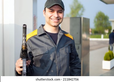 Smiling Gas Station Attendant At Work