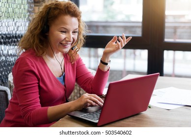 Smiling Ginger Woman Talking Per Skype