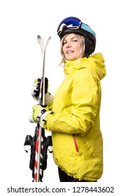 Smiling Girl In Helmet Holding Skis