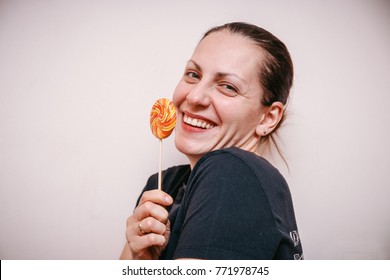 Smiling Girl With A Lollipop Smiling Girl With A Lollipop