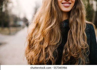 Smiling girl with long hair