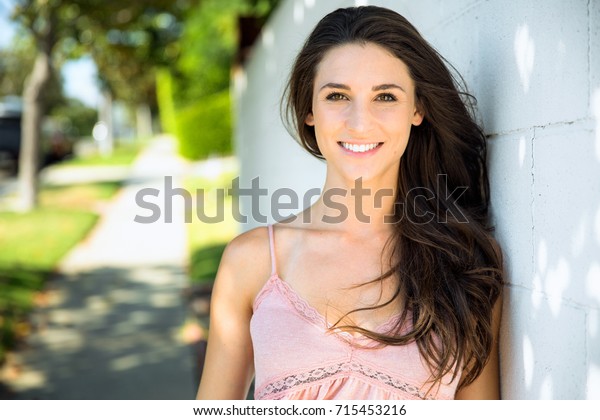 Smiling Girl Next Door Type Pure Stock Photo (Edit Now) 715453216