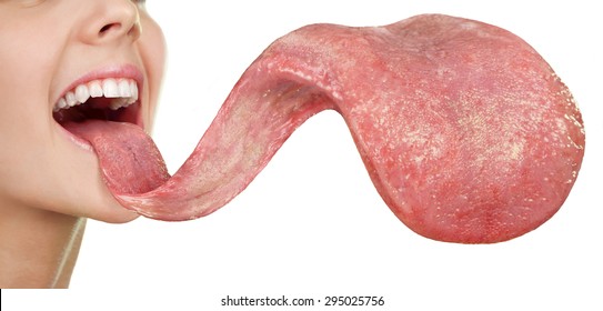 Smiling girl opening her mouth and showing the long big giant tongue isolated on white background.