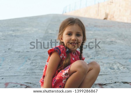 Similar – Image, Stock Photo Adorable little girl combed with pigtails