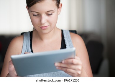 Smiling Girl With Tablet - Looking At Ipad