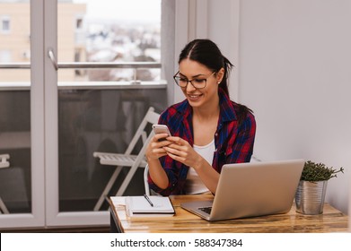 Smiling Girl Writing Flirty Message To Boyfriend