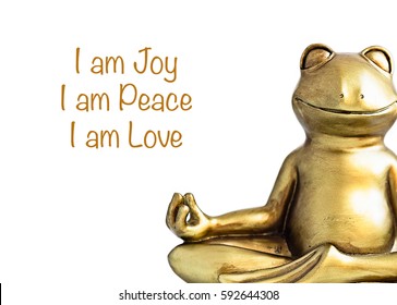 Smiling Gold Yoga Frog Meditating In Lotus Pose. Joy, Peace, Love Quote. Positive Affirmations. Isolated On White