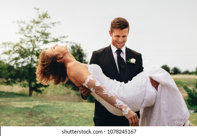 1,098 Groom lifting bride Images, Stock Photos & Vectors | Shutterstock