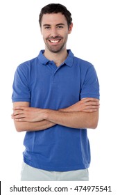 Smiling guy in casual wear, arms crossed. - Shutterstock ID 474975541